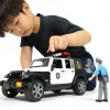 Bruder Jeep Wrangler Poliisiauto Äänellä ja Valolla sekä Hahmolla 1:16